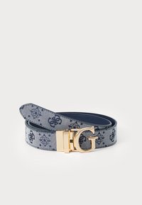 Navy patterned belt with a gold-tone "G" buckle, featuring a smooth leather backing and textile surface with decorative motifs.