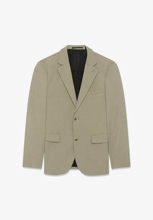 Svetlo rjavo srajčno suknjič iz gladkega blaga, z razrezanim ovratnikom, dvema sprednjima žepoma in tremi zlatimi gumbi na sprednji strani.