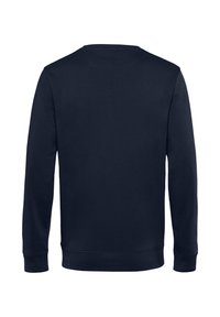 Felpa blu navy con maniche lunghe, scollatura rotonda e una texture morbida. Presenta polsini e orlo a coste; senza loghi o fantasie visibili.