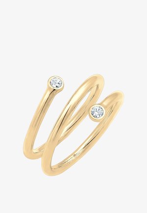Guld dobbeltbåndring med to runde klare sten sat ved hver ende, med en glat, poleret overflade og minimalistisk design.