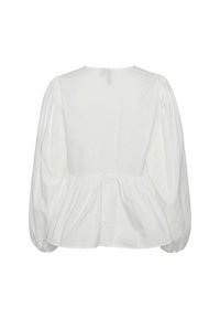 Blouse blanche avec un col rond, des manches bouffantes et une taille froncée. Fabriquée dans un tissu léger au toucher doux.