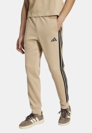 ESSENTIALS THREE STRIPES - Pantaloni sportivi - beige