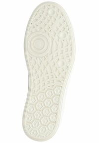 Weiße Gummisohle mit einer strukturierten Oberfläche, die ein Wabenmuster, kreisförmige Akzente und ein geometrisches Gitterdesign aufweist.