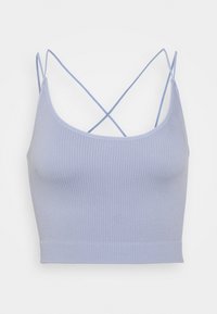 Ljusblå ribbad crop top med tunna korskorsremmar. Slät textur, åtsittande design och en bred fåll för extra struktur.