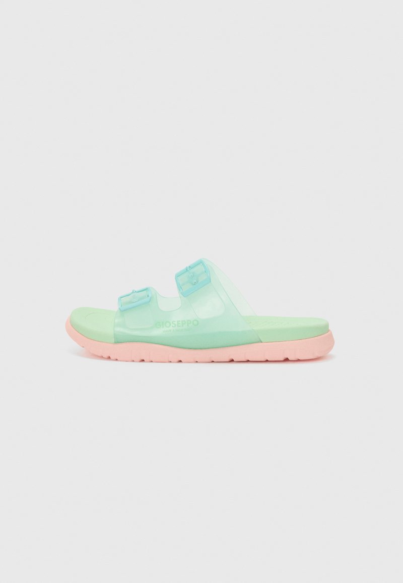 Grønne og rosa slidesandaler med et gjennomskinnelig design, to justerbare stropper, teksturert fotseng og gummisåle. Merkenavnet er synlig.