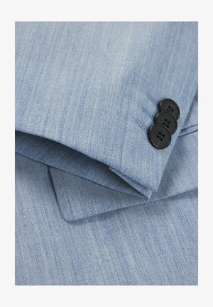 Light blue fabric with a textured finish, featuring three black buttons on the cuff and a sharp, tailored design.