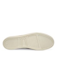 Schoenenzool van textuur rubber in crème kleur, met groeven voor grip en een afgeronde vorm. Bovenste gedeelte heeft een lichte, zachte afwerking.