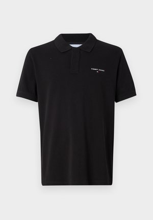 Black polo shirt made of cotton with a collared neckline. Features a small white logo on the left chest and short sleeves.