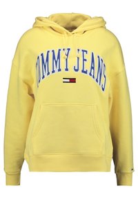 Felpa gialla con cappuccio, con testo "TOMMY JEANS" in blu, tasca a marsupio frontale, cappuccio regolabile con cordino e polsini a coste.