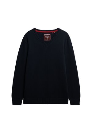 Maglione lavorato a maglia blu navy con scollatura a V, polsini e orlo a coste. Presenta un accento rosso sul collo e un'etichetta del marchio all'interno.