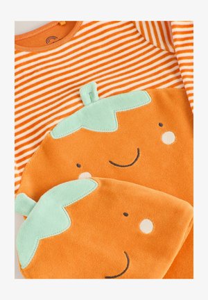 La camicia a strisce arancioni presenta un design morbido e sorridente di una ghianda in un delicato arancione e verde menta. Realizzata in tessuto morbido e testurizzato.