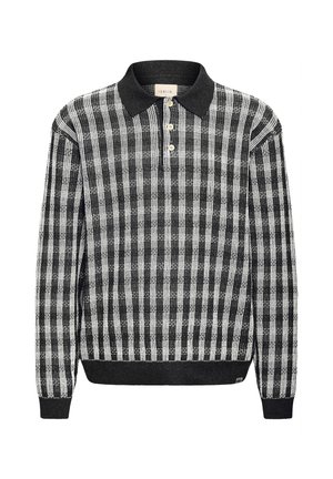 Polo a maniche lunghe in maglia a quadri bianco e nero con colletto nero solido, patta con bottoni, polsini e orlo.
