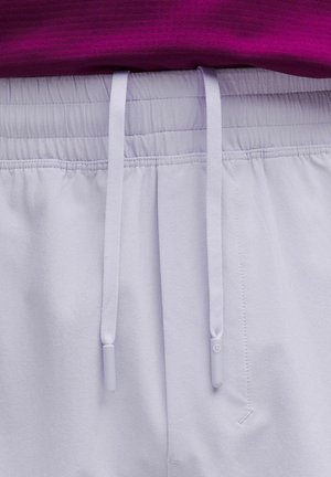 Light lavender shorts with an elastic waistband and white drawstrings, featuring a smooth fabric texture and subtle stitching details.