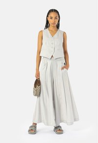 Elias Rumelis HERMA - Tygbyxor - beton