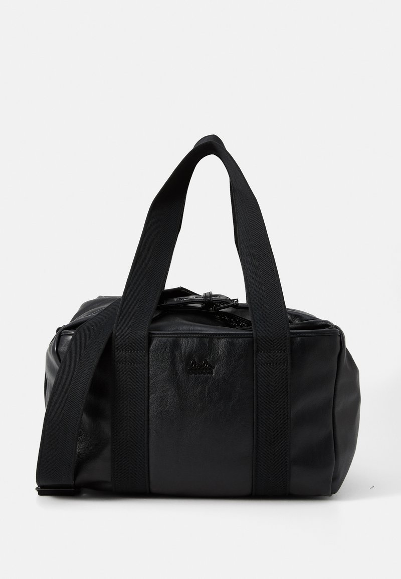 Black leather duffel bag with a structured shape. Features black textile handles and a top zip closure. Subtle logo on the front.