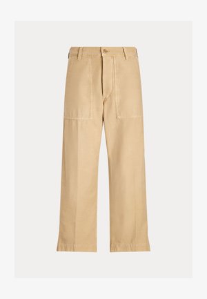 Platūs smėlio spalvos kelnės su priekinėmis kišenėmis, diržo kilpelėmis ir sagos užsegimu.
