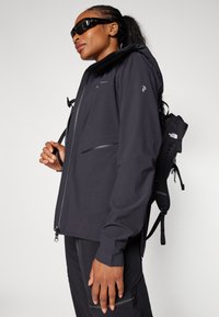 Peak Performance COMMUTER HIPE  - Regenjas - black