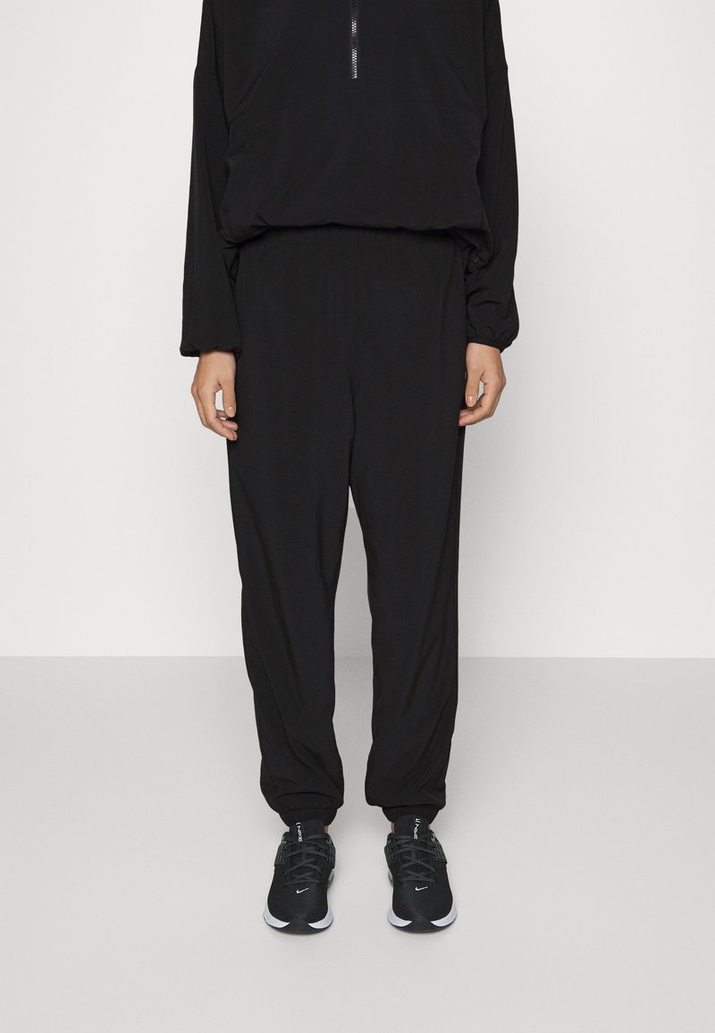 GAP RUNAROUND LINED Tracksuit bottoms true black/black Zalando.de