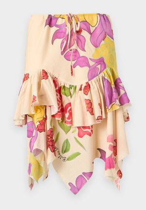 Jupe à imprimé floral avec ourlet à volants, présentant des couleurs pastel dont le rose, le jaune et le vert. Ceinture ajustable à nouer, tissu léger.