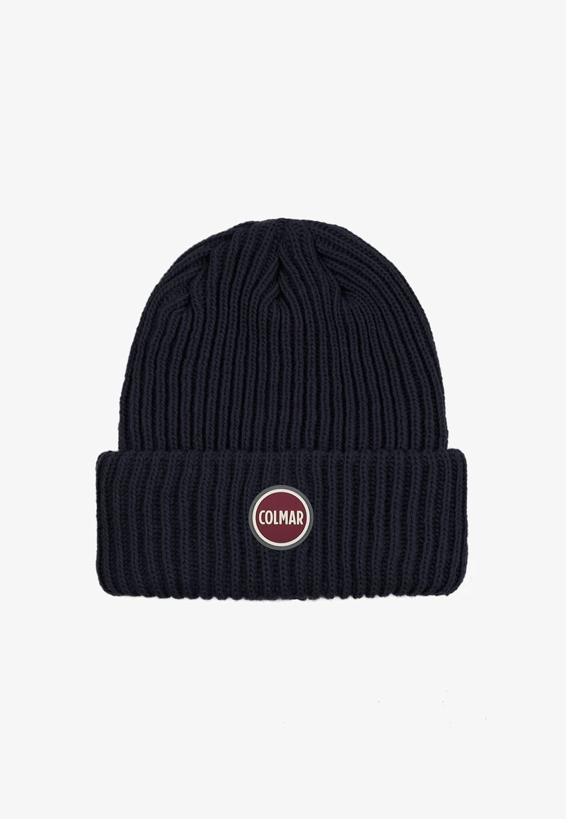 Tumed villane beanie ribblikujulise tekstuuriga, millel on volditud serv ja ümmargune punase ja valge Colmari logo patch esiküljel.