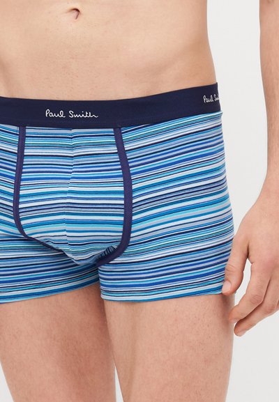 Boxer-briefs pour hommes avec une ceinture bleu marine comportant le logo blanc "Paul Smith". Le tissu présente des rayures horizontales dans différentes nuances de bleu.