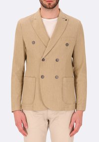 Giacca beige doppiopetto con rever a scollo, due tasche frontali e bottoni scuri; realizzata in tessuto testurizzato. Design leggero.