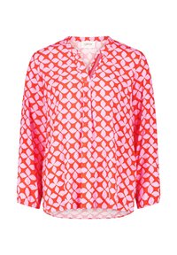 Blouse rouge à manches longues avec un motif de feuilles abstraites roses, décolleté en V avec fermeture éclair cachée et poignets élastiques.
