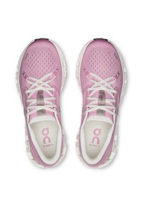 Light pink mesh athletic shoes with white laces and soles. Features include "Cloud X" branding, ventilation holes, and a two-tone design.