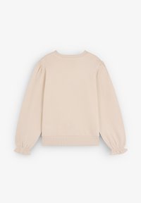 Sudadera beige con mangas largas suavemente fruncidas, dobladillo y escote acanalados. Textura suave, diseño sencillo y sin logotipos ni patrones visibles.