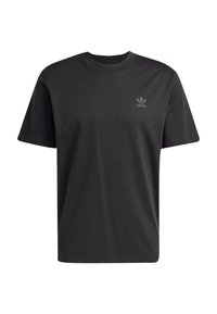 Fekete pamut póló rövid ujjakkal, kerek nyakkal és egy tónusos Adidas logóval a bal mellen. Simaság és unisex kialakítás jellemzi.