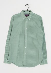 Grøn og hvid ternet langærmet skjorte med knap-lukning på kraven, hvide knapper og en buet kant, lavet af let materiale.