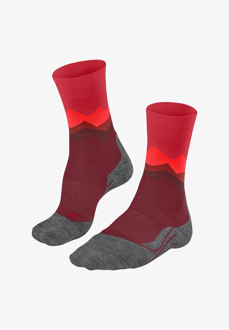 Calze al ginocchio con design sfumato in colori rosso, arancione e bordeaux; tallone e punta grigi; texture liscia.