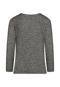 Strickoberteil im schwarz-weißen Hahnentrittmuster, mit langen Ärmeln und Rundhalsausschnitt. Weicher Griff mit lässiger Silhouette.