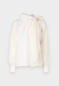 Blouse blanche transparente à manches longues avec de subtils rayures verticales et un col montant noué sur le côté.