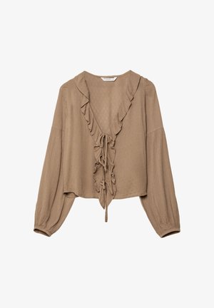 Brun, långärmad blus med volang i V-halsen och framknutningar. Tillverkad av texturerad tyg med subtila mönster, kort modell.