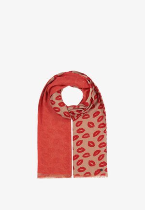 Red scarf featuring a beige section with repeated red lip patterns. Soft texture with fringe detailing at the ends.