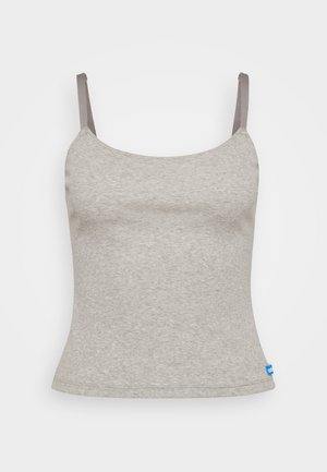 Grå, tætsiddende camisole med tynde, justerbare stropper. Tekstureret stof med en glat overflade. Lilla etiket ved sømmet på højre side.