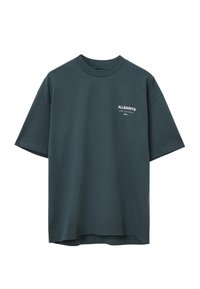 T-shirt oversized vert foncé à manches courtes avec un petit texte blanc "ALLSAINTS" sur la poitrine gauche.