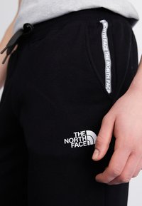 The North Face ZUMU JOGGER Tracksuit bottoms black