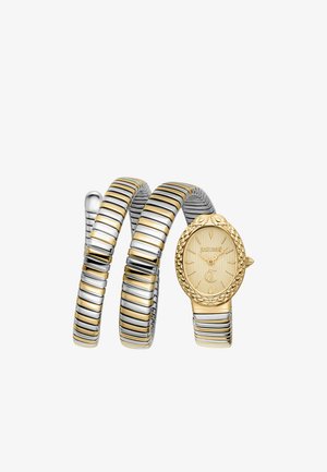 Gespoeld horloge met ovalen goudkleurige wijzerplaat en flexibele, gestreepte metalen band in afwisselende goud- en zilvertinten.