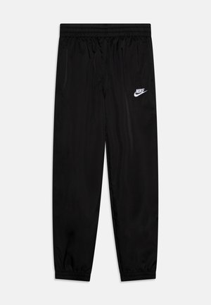 Mustad mustad spordipüksid, mis on valmistatud siledast, kergest materjalist, elastse vöökoha ja mansettidega. Vasakul reitel valge Nike'i logo.