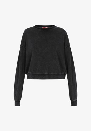 Fekete rövidített pulóver hosszú ujjakkal, kerek nyakkal és textúrált anyaggal. Lazán illeszkedő fazonja van, ribbelt mandzsettával és derékrésszel.