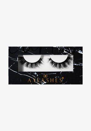 Black faux mink eyelashes displayed on a marble-patterned box with gold lettering. Features a full, fluffy design with varied lengths.