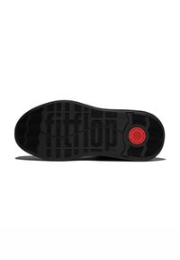 Black rubber shoe sole with textured grooves and a circular red accent featuring the "fitflop" logo. Durable design for grip and comfort.