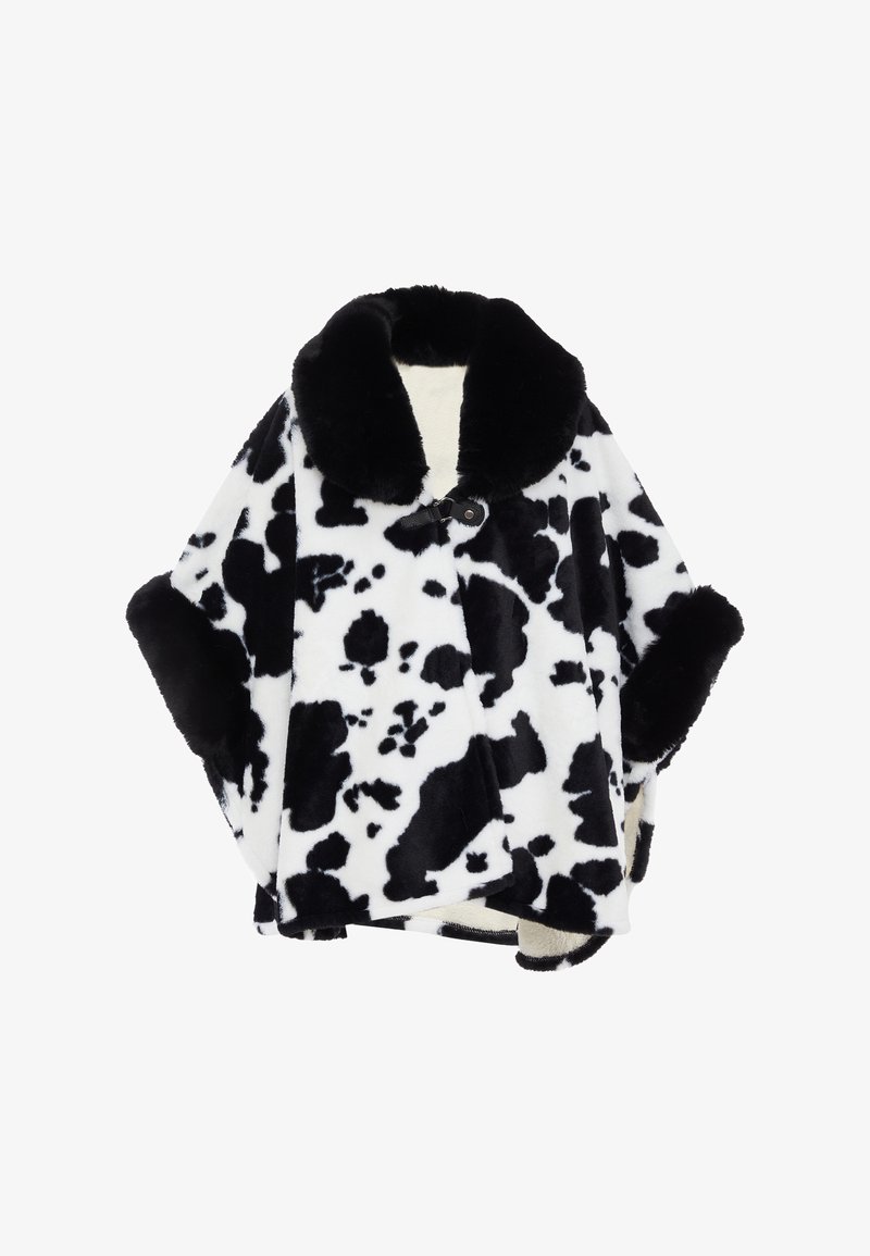 Poncho de piel sintética en blanco y negro con un diseño de estampado de vaca, que cuenta con un gran cuello negro y puños, además de un cierre de botón.