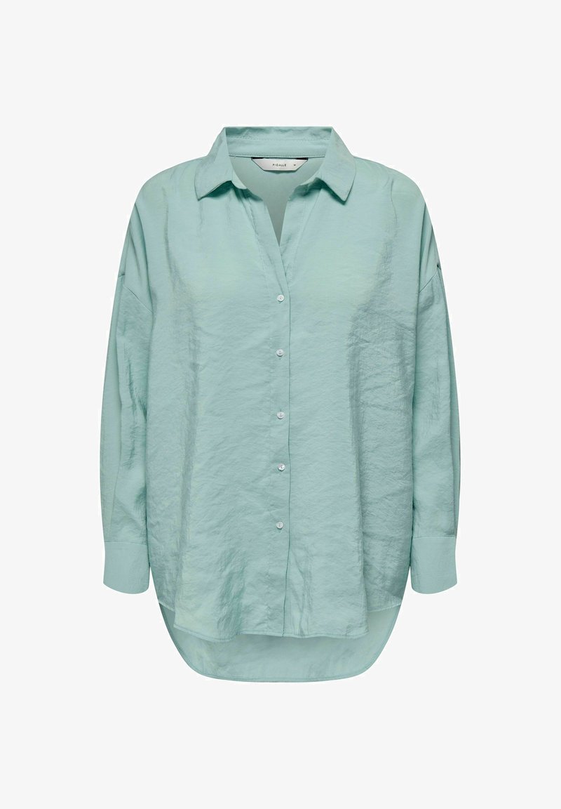 Chemise vert clair à manches longues, boutonnée, fabriquée dans un tissu texturé et léger. Elle présente un col classique et un ourlet arrondi.