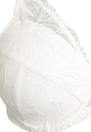 Sujetador blanco con bordado floral, que presenta una superficie mate suave, un delicado ribete de encaje y una forma de copa curva que resalta patrones intrincados.