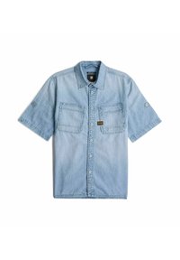 Ljusblå denimskjorta med kort ärm som har en knappslå framtill, två bröstfickor och sömnadsdetaljer på axlarna.