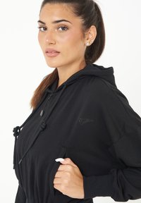 LEGEA TRIXY - Felpa con zip - nero