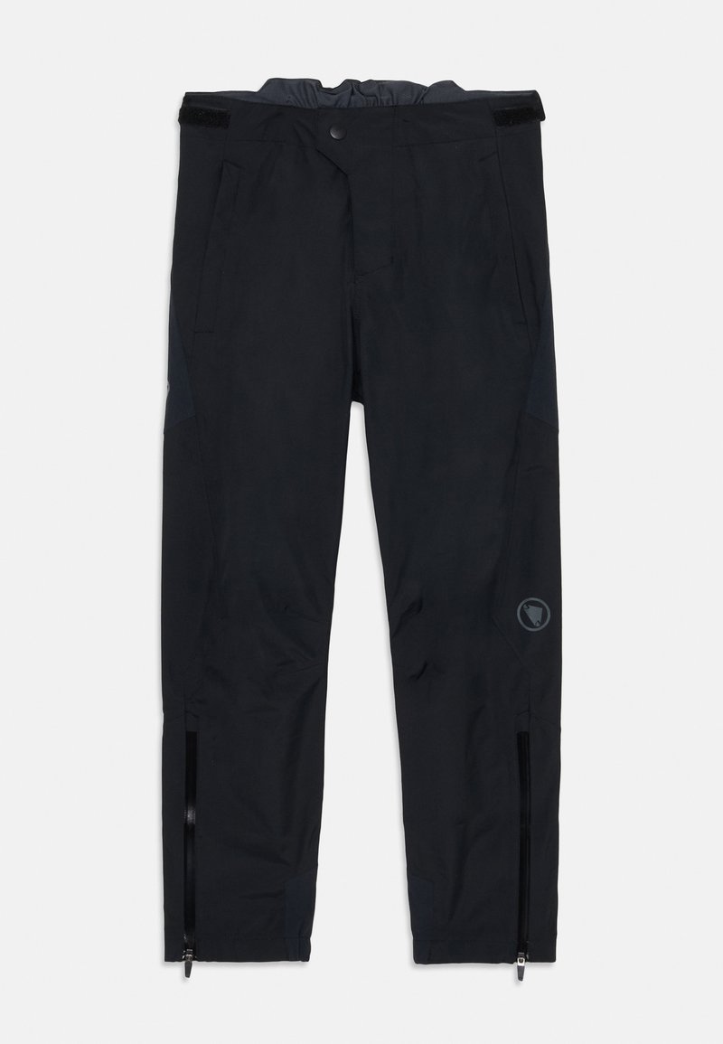 Melni ūdensizturīgi bikses ar gludu tekstūru, ar sprādzes pogu aizdari, divām sānu kabatām un rāvējslēdzējiem apakšējā kāju daļā ventilācijai.